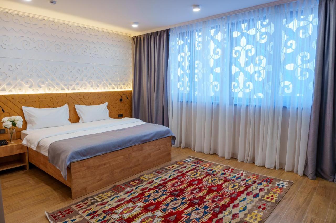 Dami Almaty Hotel Экстерьер фото