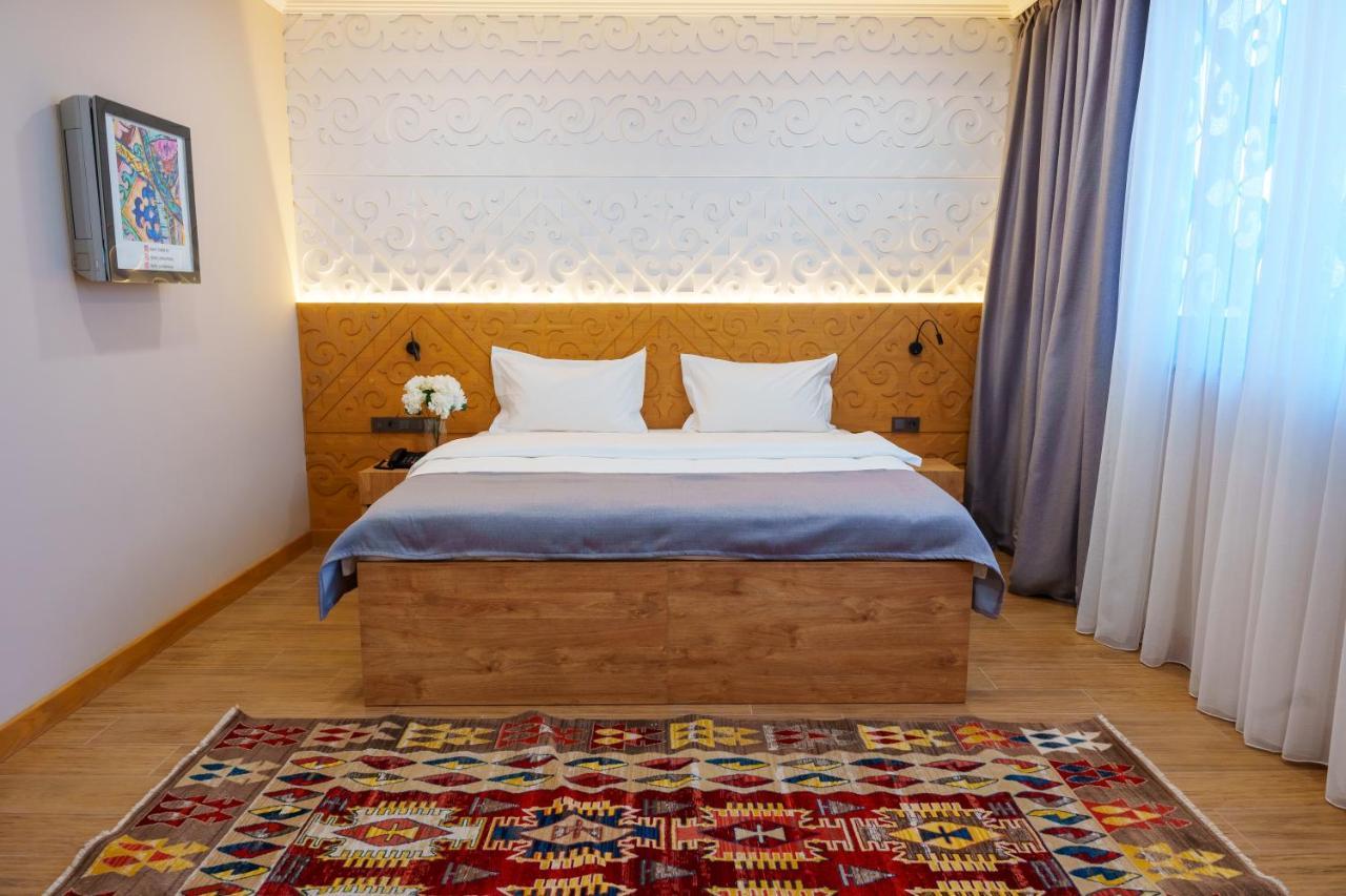 Dami Almaty Hotel Экстерьер фото