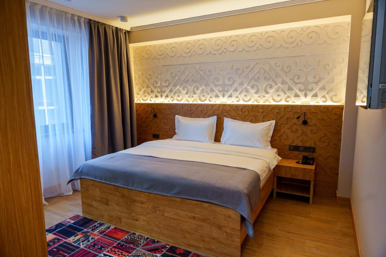 Dami Almaty Hotel Экстерьер фото