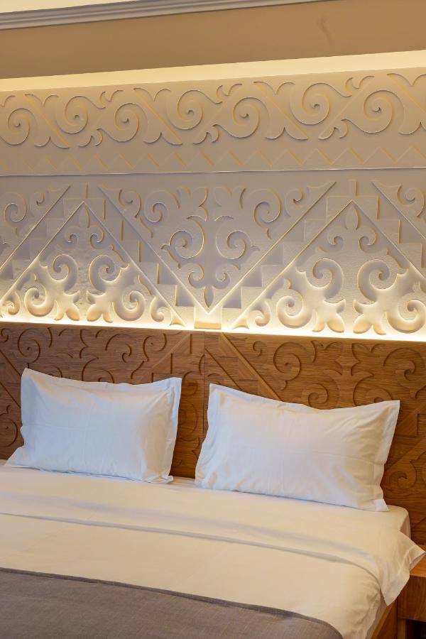 Dami Almaty Hotel Экстерьер фото