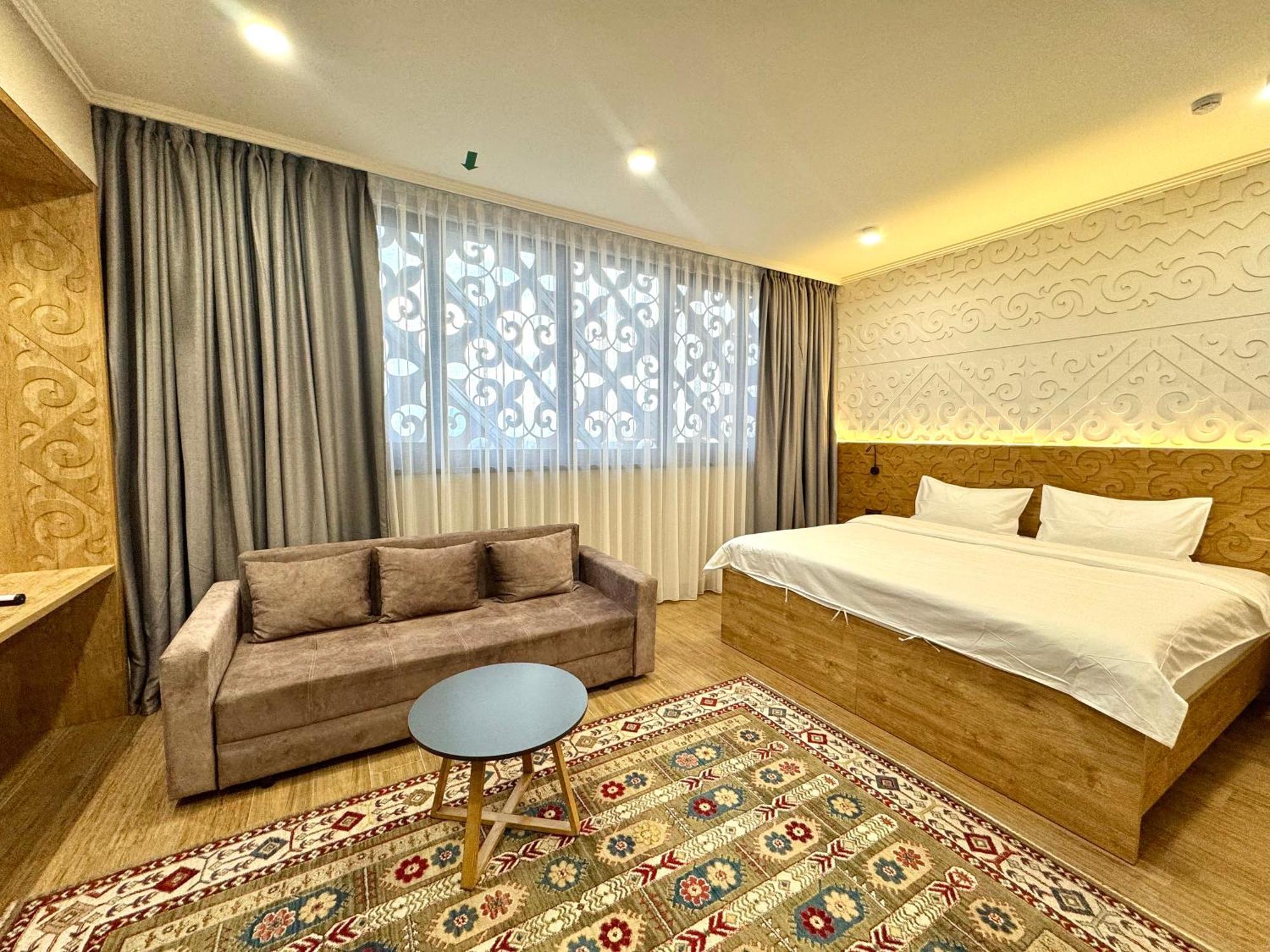 Dami Almaty Hotel Экстерьер фото