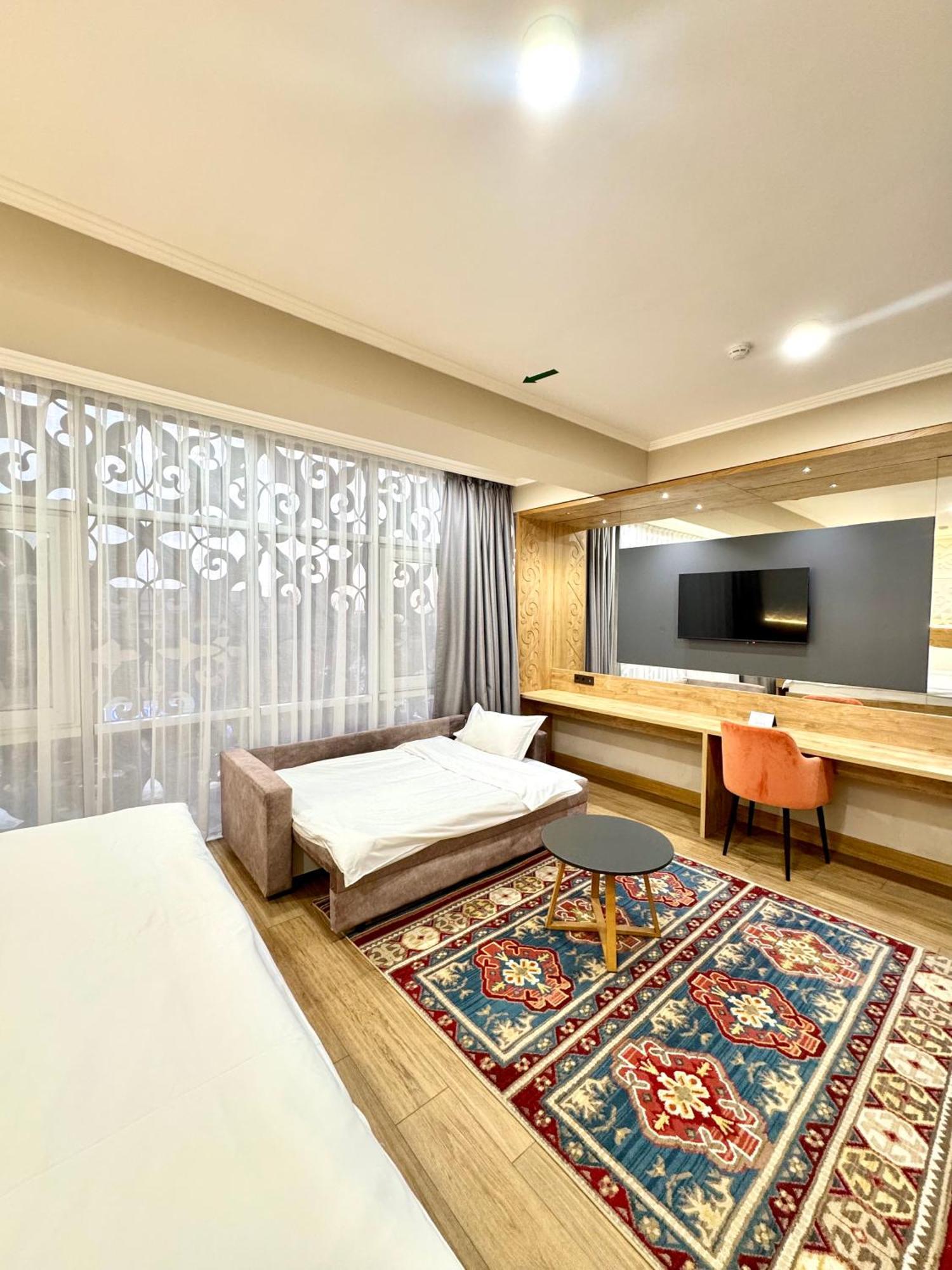 Dami Almaty Hotel Экстерьер фото